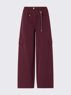 Pantaloni oversize con charm