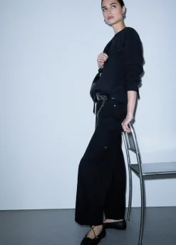 Pantaloni oversize con charm
