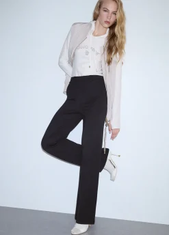 Pantaloni regular fit in punto milano