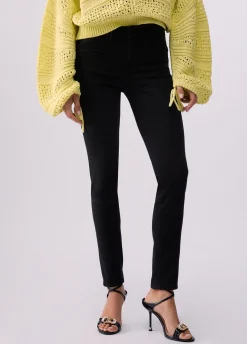 Pantaloni skinny a vita alta