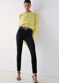 Pantaloni skinny a vita alta