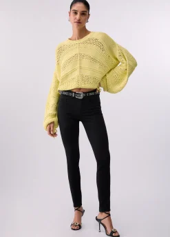 Pantaloni skinny a vita alta
