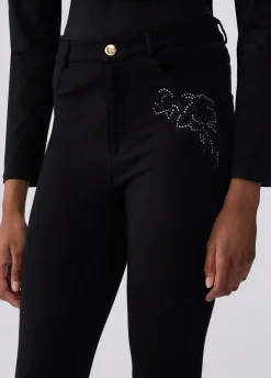 Pantaloni skinny con ricamo gioiello