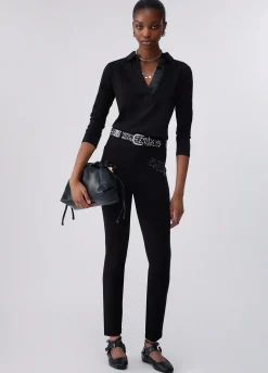 Pantaloni skinny con ricamo gioiello