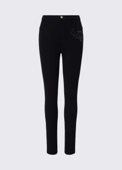 Pantaloni skinny con ricamo gioiello