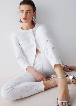 Pantaloni skinny con ricamo sangallo