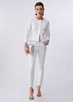 Pantaloni skinny con ricamo sangallo