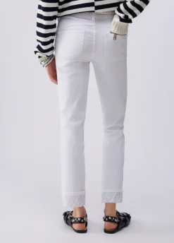 Pantaloni skinny con risvolto e strass