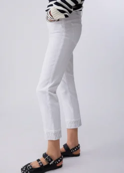 Pantaloni skinny con risvolto e strass