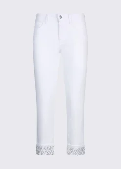 Pantaloni skinny con risvolto e strass