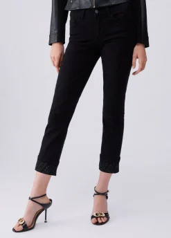 Pantaloni skinny con risvolto e strass