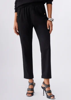 Pantaloni slim fit con risvolto