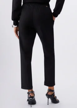 Pantaloni slim fit con risvolto