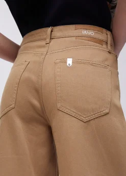 Pantaloni super flare a vita alta