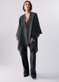 Poncho con logo embossed