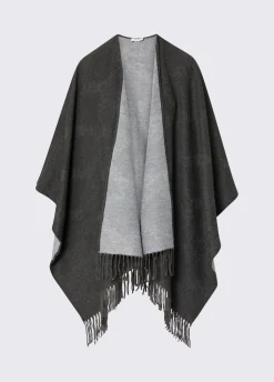 Poncho con logo embossed