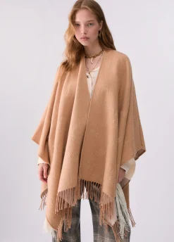 Poncho con logo embossed