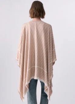 Poncho con logo jacquard