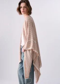 Poncho con logo jacquard