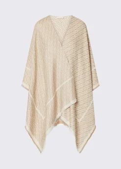 Poncho con logo jacquard