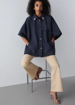 Poncho trench con ricami gioiello
