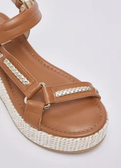 Sandali platform in pelle