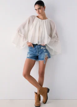 Short in denim con ricami gioiello