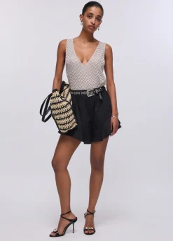 Shorts con volant