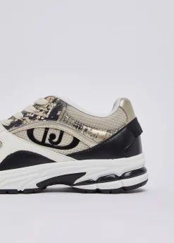 Sneakers effetto pitone
