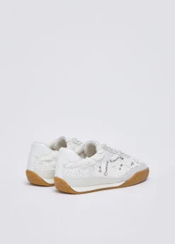 Sneakers in denim con pietre gioiello