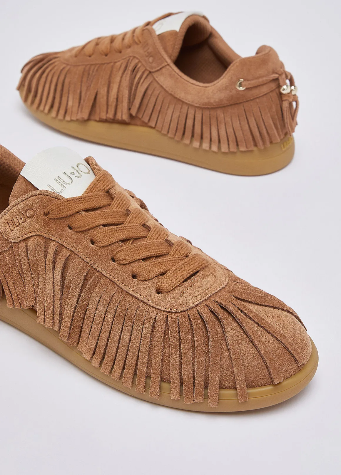Sneakers in suede con frange