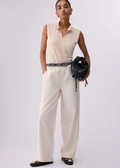 Top con mezza zip