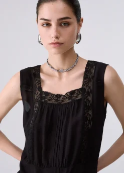 Top con pizzo