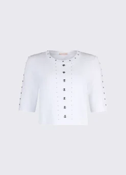 Top in maglia con borchie