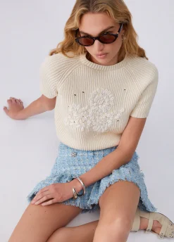 Top in maglia con ricamo in rafia