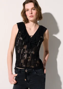 Top in pizzo con volant