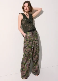 Top in pizzo con volant