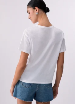 T-shirt con applicazioni gioiello