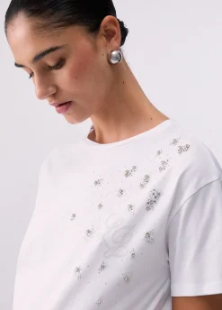 T-shirt con applicazioni gioiello