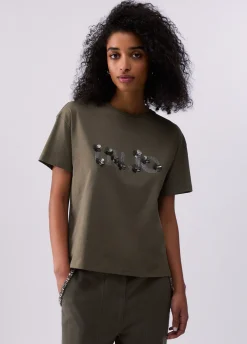 T-shirt con applicazioni gioiello