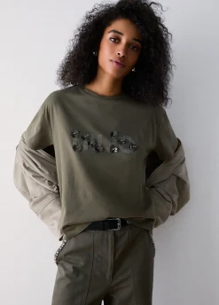 T-shirt con applicazioni gioiello