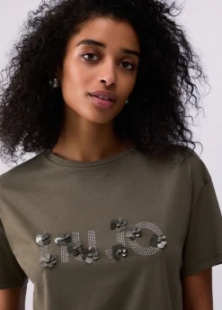 T-shirt con applicazioni gioiello