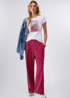 T-shirt con stampa e applicazioni
