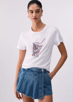 T-shirt con stampa e applicazioni