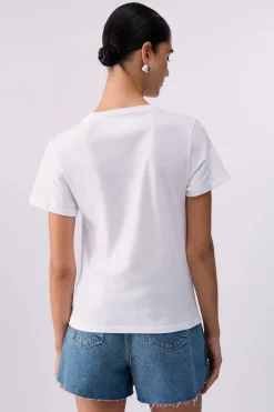 T-shirt con stampa e applicazioni