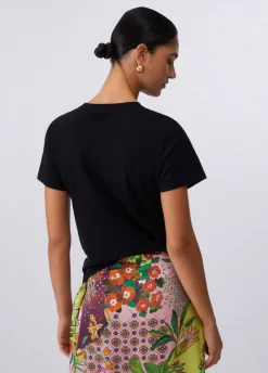 T-shirt con stampa e applicazioni