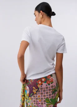 T-shirt con stampa e applicazioni