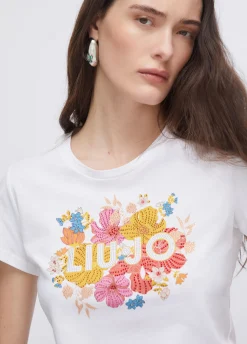 T-shirt con stampa e strass