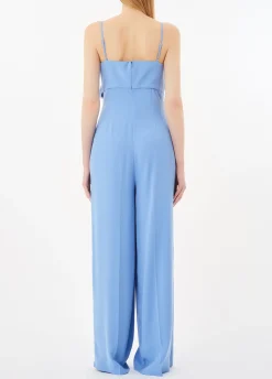 Tuta elegante con fiocco