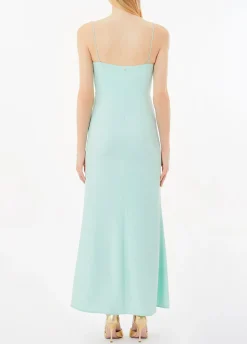 Vestito elegante con piume
